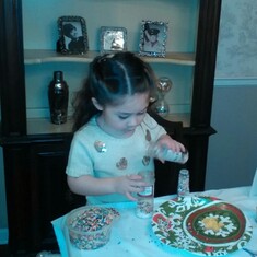 Marie's grandchild JuJu Christmas 2015 decorading cookies.