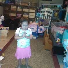 Niece Nikky daughter JuJu. I hope she isn't praying for more toys.