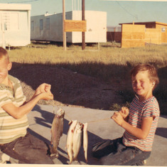 Mike and Vicki steppin Dad's foot in fishing 1966