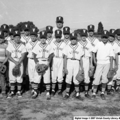 Dad on his little league team (he's the one third from left with his eyes closed)