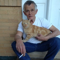 Dad and Timmy the Cat on the porch at the Opal house