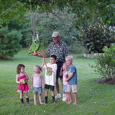 Grandpa helping with Birthday games, 2004