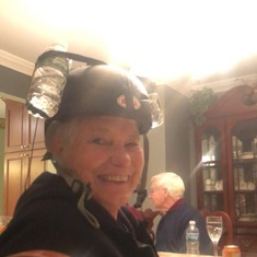 Nanny wearing the “drinking helmet” that Raymond made at Christmas dinner
