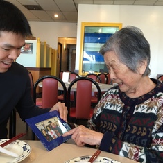 Chris presented his graduation picture to Auntie Madeline in Nov 2018.