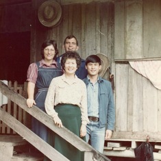 Madelyn, Winston, Vicki and Dalton on the steps fo the tabernacle at La Aurora farm