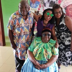 Mama rocking her shades with some of her children, March 2019