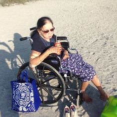 Enjoying Fanta and chips on the beach
