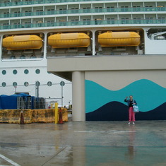 Marcia waving before an excursion from her ship