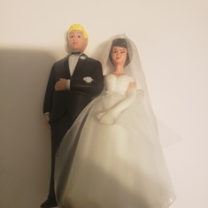His wedding cake topper- Anne Moore made the cake and dyed the groom's hair blonde for him.