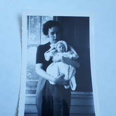 1951 - Margaret holding baby Delrose Vincent 