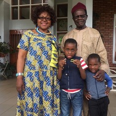 Professor Tandap and Mrs. Tandap with grandchildren