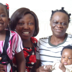 Mum and  her daughter in law  with  two of her grandchildren