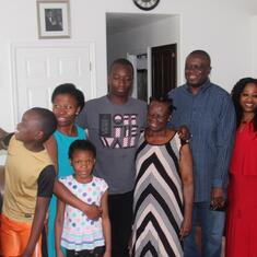 Dr (MRS) OMOTOWA with one of her in-laws, a children, daughters-in-law and grandchildren