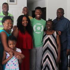 Dr (MRS) OMOTOWA at home in the USA with her in-law, children, daughters-in-law and grandchild