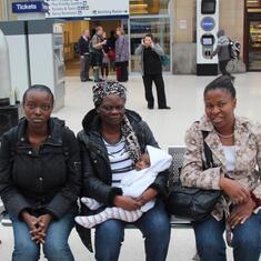 Dr (MRS) OMOTOWA with her daughter, a daughter-in-law and a grandchild