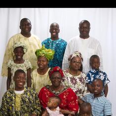 Dr (MRS) OMOTOWA with her children, daughters-in-law and grandchildren