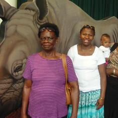 Dr (MRS) OMOTOWA at Disney with her daughters-in-law and a grandchild