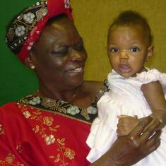 Dr (MRS) OMOTOWA and a grandchild