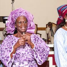 Dr (MRS) OMOTOWA at chiurch with her daughter, daughter-in-law and grandchild