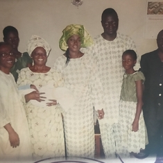 Grandma and family during her grandchild's naming ceremony