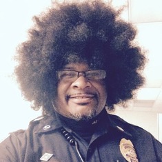 Officer Afro Man