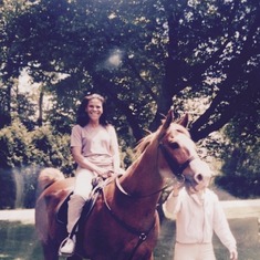 Mommy riding a horse in Massachusetts