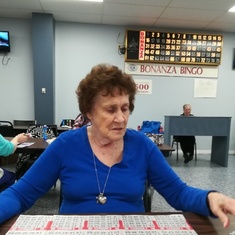 Mom setting up her Bingo cards on our night out.