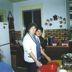 Grandma in the kitchen with daughter, Neldita