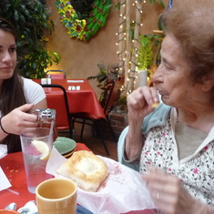 Mika and Aunt Vicha sharing a sopapilla at La Posta