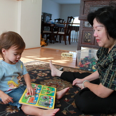 September 28, 2009 - Laila reads to Ba