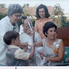 At their 25th wedding anniversary, Marie and Albert with a young Albert Michael, mother Rose, and Godmother Ann Germano, 1972