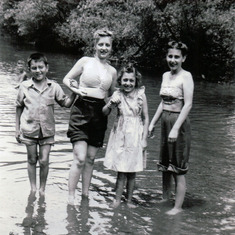 A young Marie with soon to be sister-in-law Stella and youngsters, 1945?