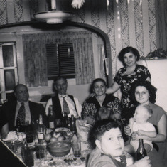 Marie with her in-laws, the DeMayo Family. Albert parents Michael and Alessandra and family, 1950?