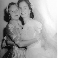 Mom and her sister Ginny on Mom's wedding day.