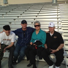 Thomas, Dan, Mom and Dad Sitting in CLU stadium. 3/2014.