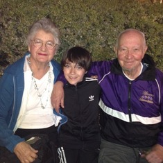 Jordan with Grandma and Grandpa at Disney Downtown.