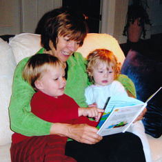 Grandma Marilyn reading to Evan and Anna