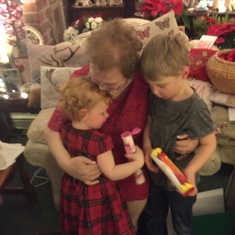 Mrs Smith with Izzy aged 2 and Sebastian, 4 Christmas 2018. She loved and understood children & they responded to her warmth. One of many pics with bundles of children in her arms!