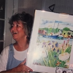 Marj at Retirement Celebration - Happy with Dee's Painting - 2002