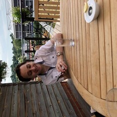Mark relaxing outside at the Wimbledon Club before the tennis
