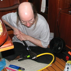 Making battery cables on the boat.
