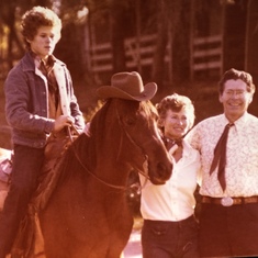 On Ginger with parents.  Became quite a horseman with lessons from the old cowboy, Mr. Sutherland