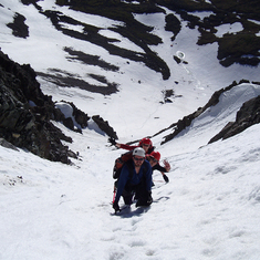 Mark leading friends on a snow climb