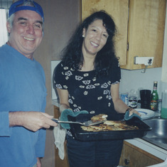 At the beach Mark and Rocio cooking and having a great time!