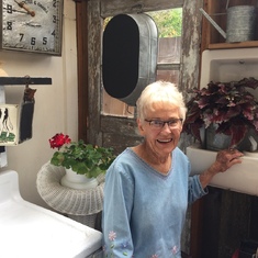 Marolyn in daughter-in-law Sally's "She Shed" in Eugene. The drinking fountain is one Marolyn bought -- because it was right next to it that her and Warren met at a Corvallis High dance.