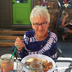 Marolyn enjoying outdoor brunch in Bend summer 2016. With her were grandson Will Crew and son Bob.