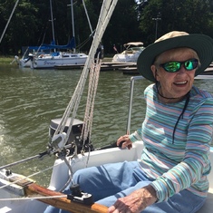 Marolyn's favorite outdoor pursuit: sailing. Taking the boat out of the Richardson Point moorage in 2016.