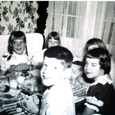 cousin Patti (pigtails), Martha, Carol, cousin Ann and David in Grandmother's Breakfast Room at Kalmia Road.