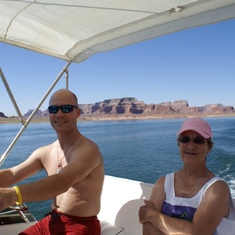Marti at the helm with Son - Lake Powell 2007
