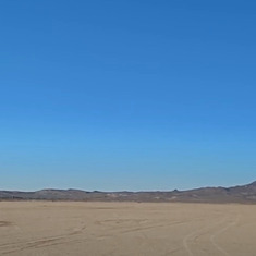 Marty in the desert between Los Angeles and Las Vegas showing his plane.